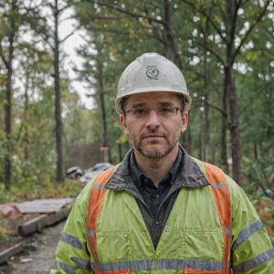 Environmental engineer and company founder in professional attire